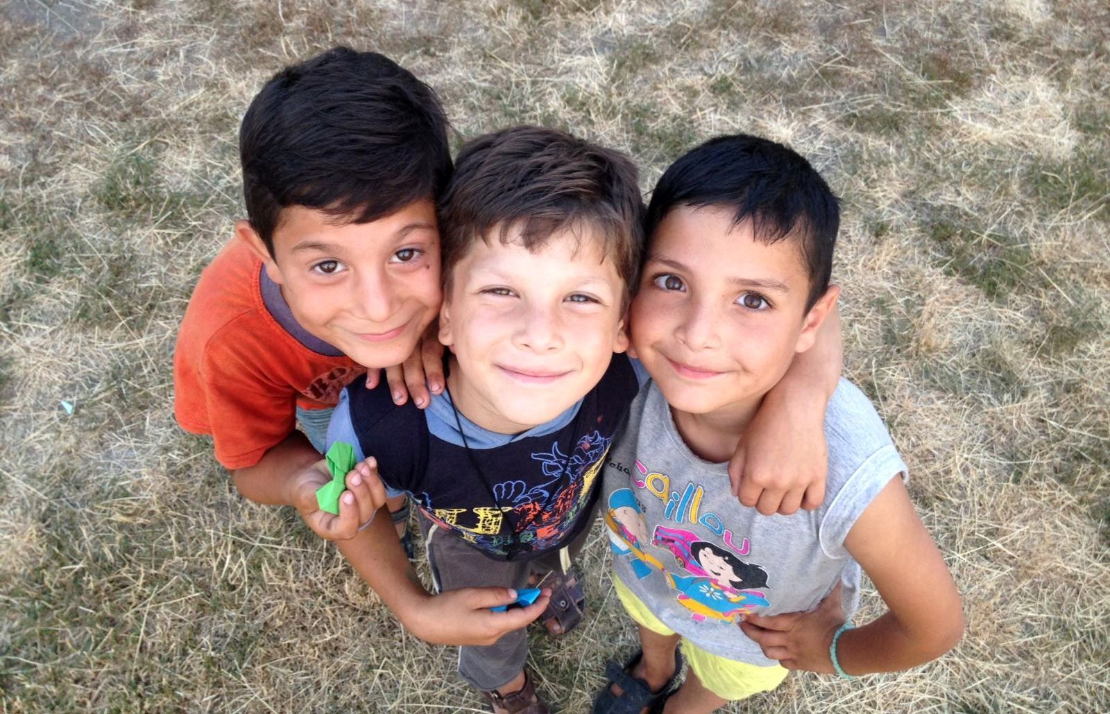 Boys smiling while joining a Kids Program organized at Bus4Life