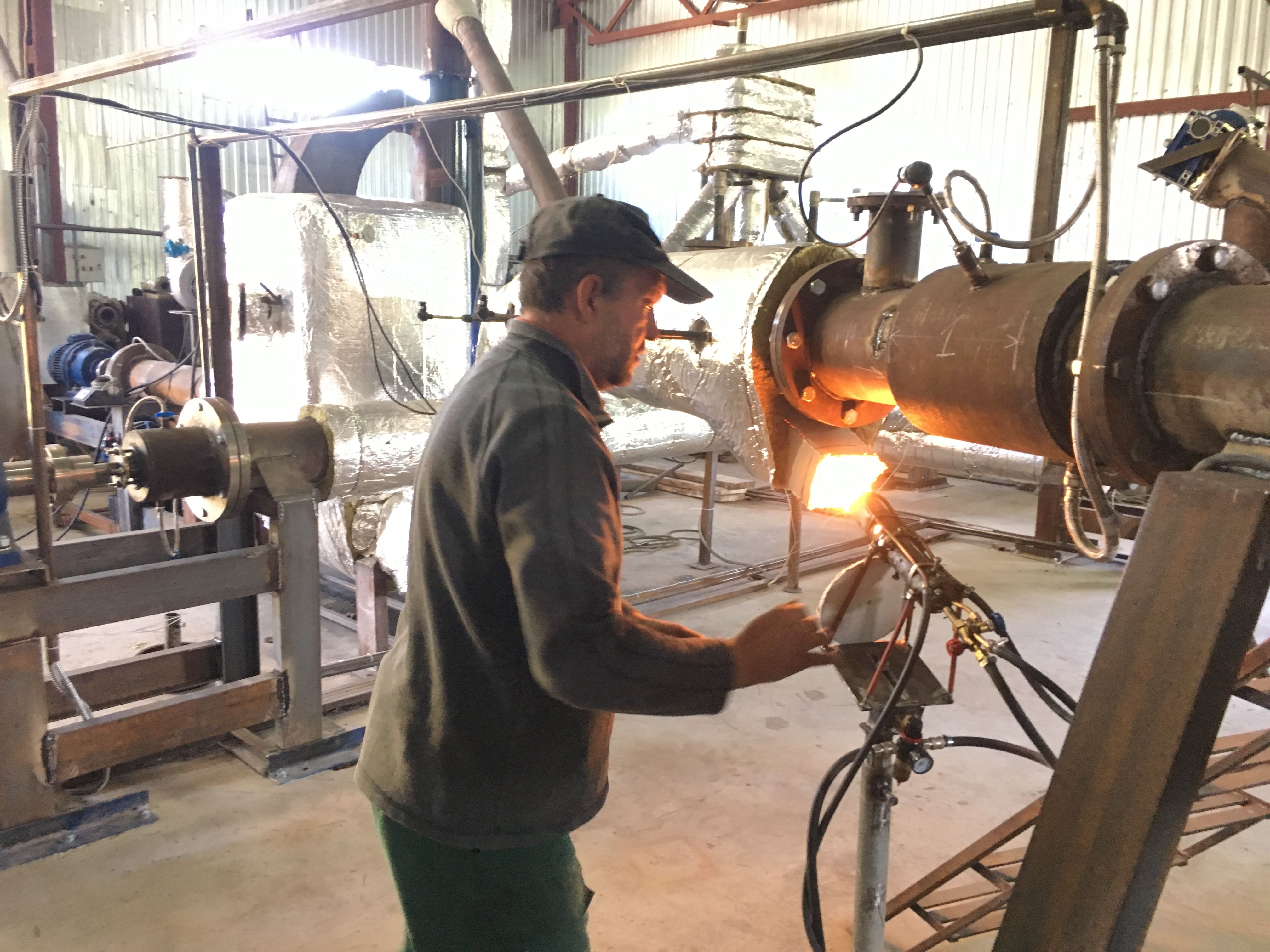 The factory hall in Kaharlyk, where the pyrolysis process converts plastic waste into liquid fuel.