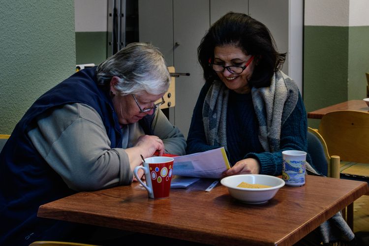 Xenos team working with refugees through friendship and mentoring, helps them to acclimate to new cultures.  Photo by Garrett N