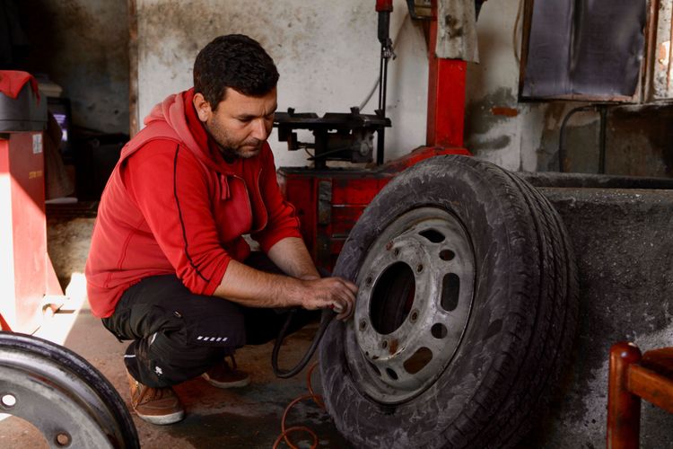Local Albanian putting into practice business skills learned at OM Albania's Business As Mission (BAM) training.