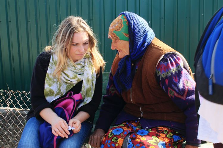 A Moldovan OM worker speaks to an old lady during an outreach that was part of OM Moldova’s “Challenge into Missions” programme. This 10-week training course offers young Moldovans their first experience of missions.