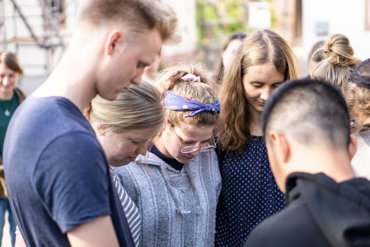 MDT Love Europe team members are praying before goint to their outreaches