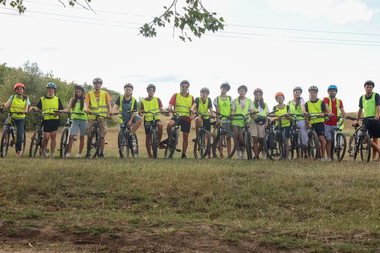 A group prepares to cycle from village to village to share the gospel. Photo by Jordan Wilkinson.
