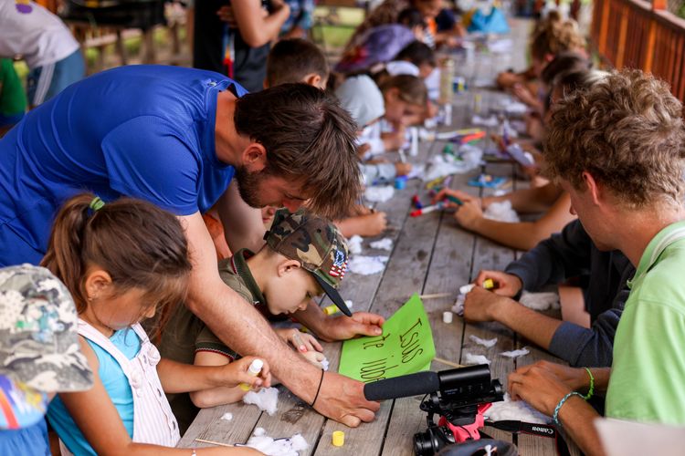 A short term team helps children during craft time. Photo by Jordan Wilkinson.