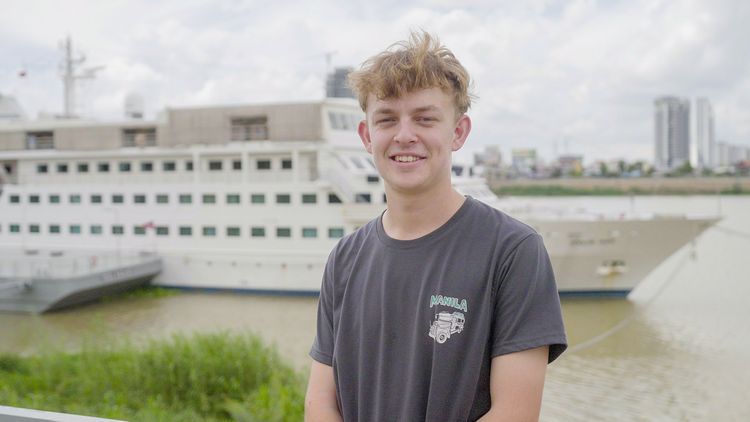 Phnom Penh, Cambodia :: Noah (Belgium/Northern Ireland) smiles in front of Doulos Hope