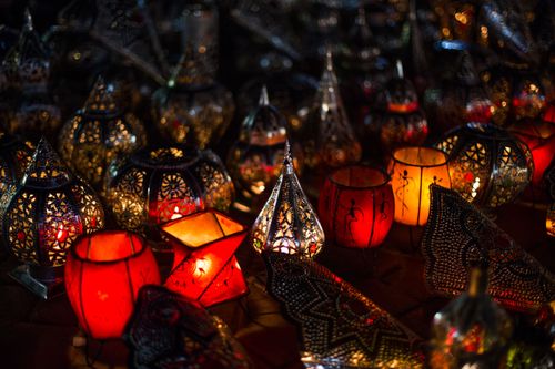 The intricate designs of the Moroccan lanterns cast a glow into the markets at night.  
Photo by Josiah Potter