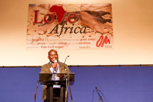 Africa Area leader Pastor Melvin Chiombe speaks at Love Africa in Kabwe, Zambia.