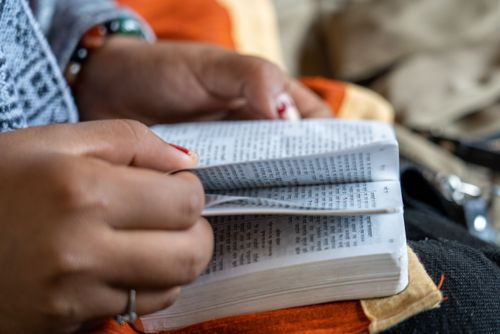 Someone in South Asia reads the Bible. Photo by RJ Rempel.