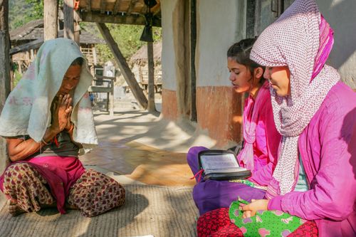 Three women in South Asia spend some time in prayer together. In remote places, times of fellowship with other Jesus followers is a special occasion.