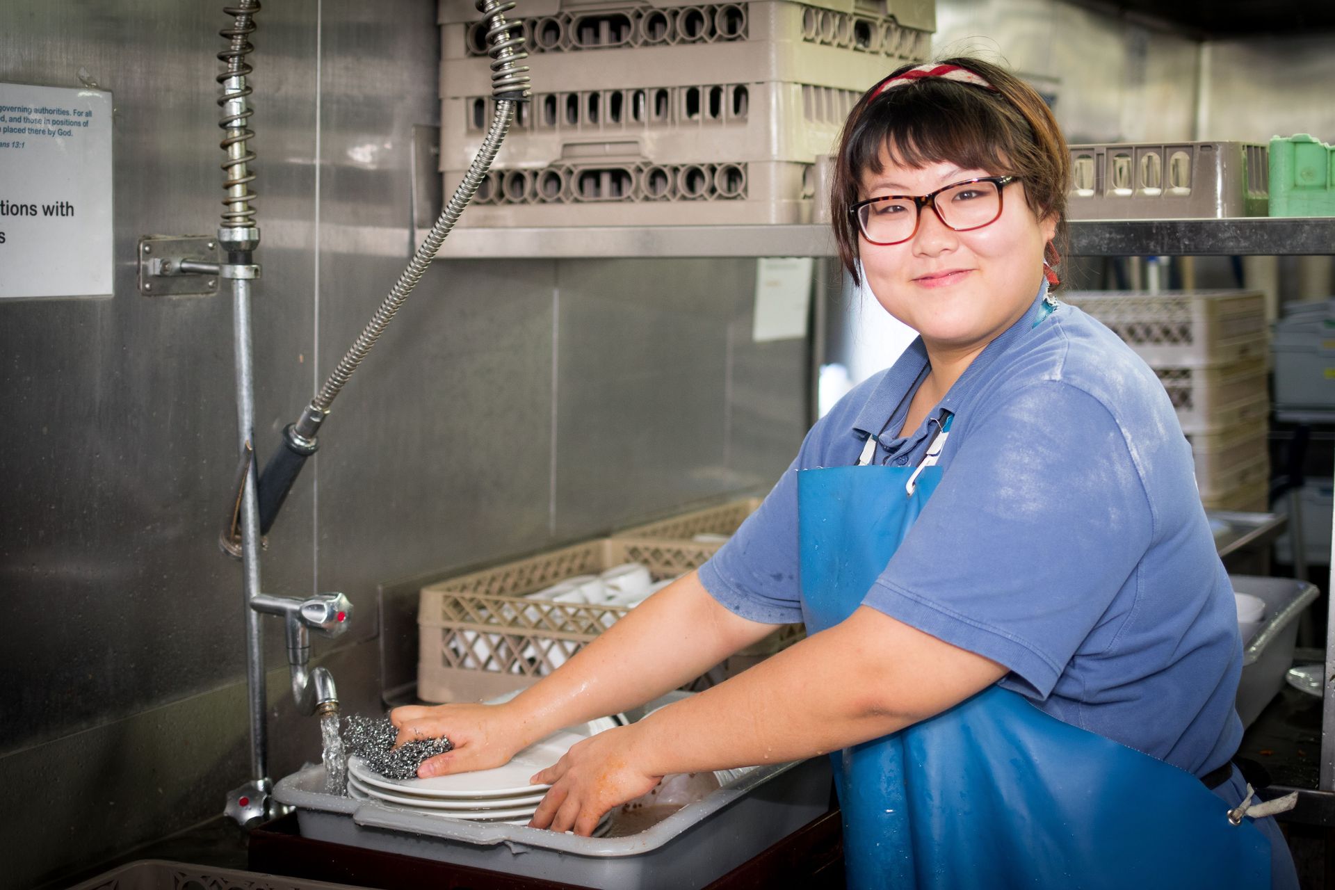 Cape Town, South Africa :: Pantry member, Sung Kwon (Mongolia) cleans over 500 dishes after each meal.