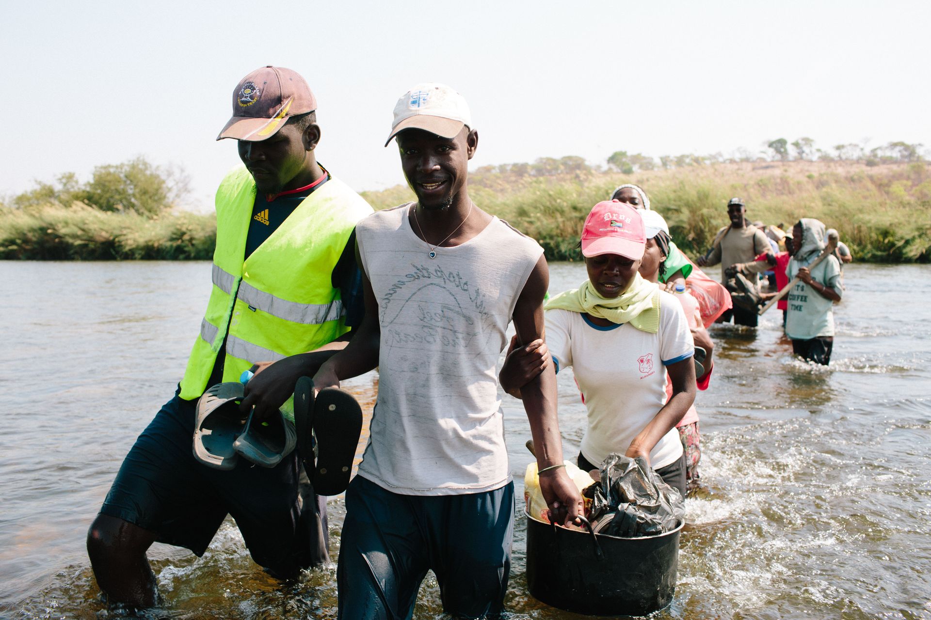 OM Angola trainees reach out to bushmen during this outreach they cross the Okavango river.