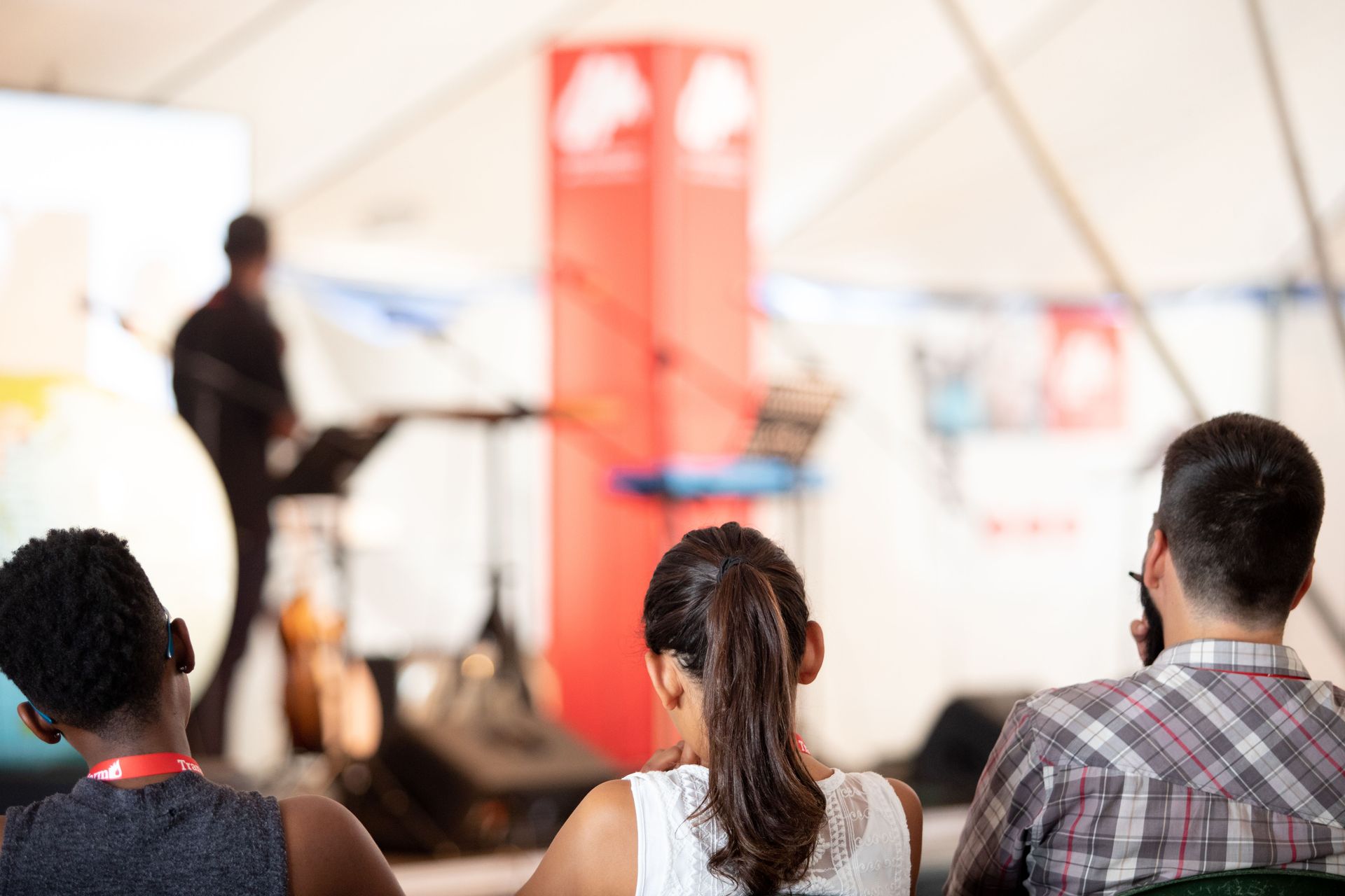 Transform participants listen to a speaker in Greece. Photo by Rebecca Rempel.
