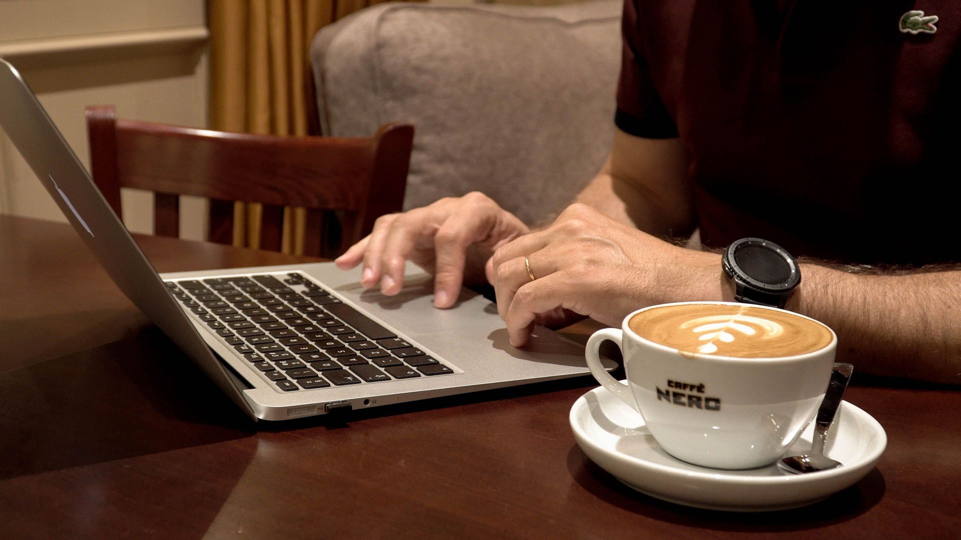 A marketplace worker spends the afternoon doing his job remotely at a local coffee shop. Photo by Jay S.