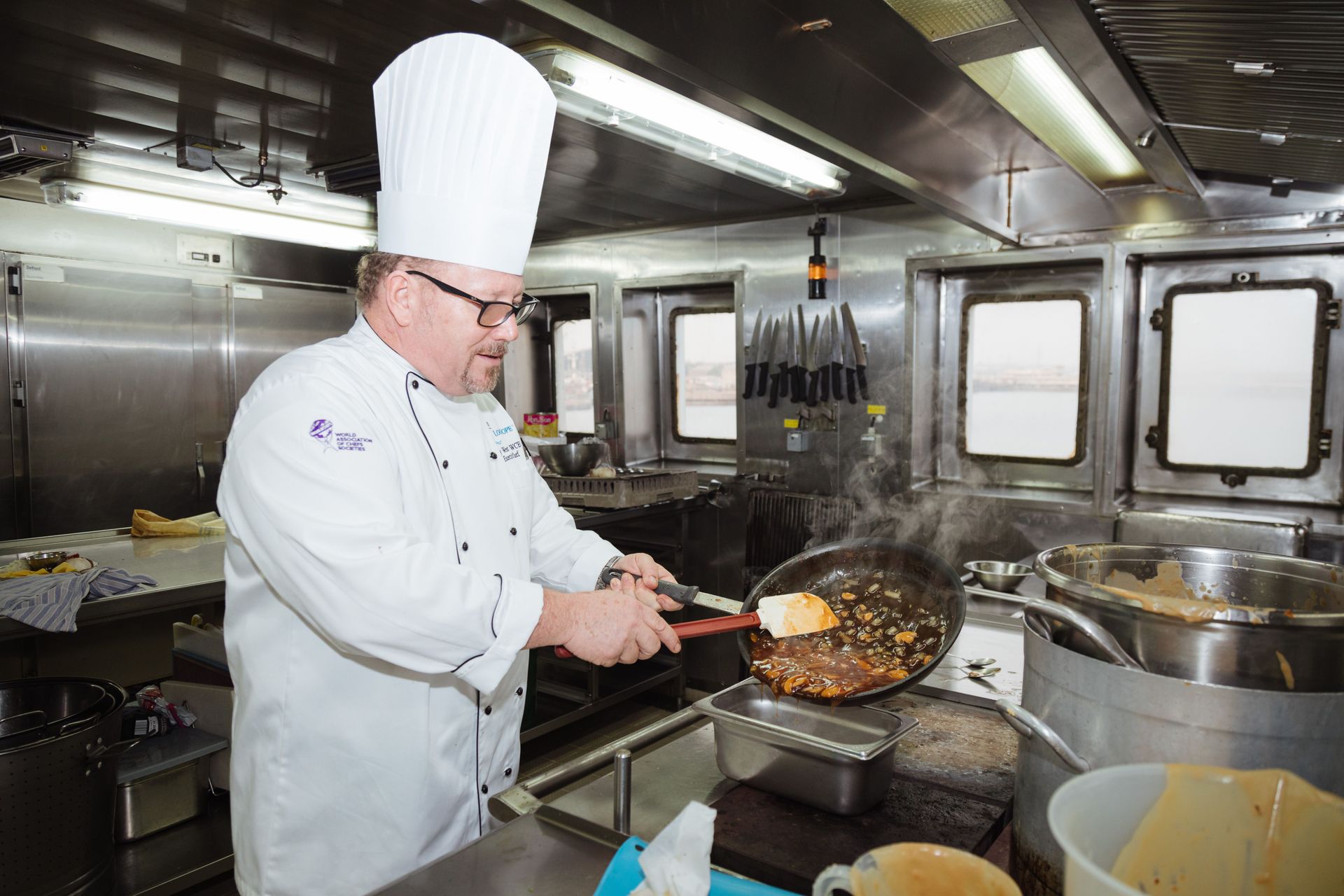 Tema, Ghana :: Andy West (USA) serves on board Logos Hope as chief cook.
