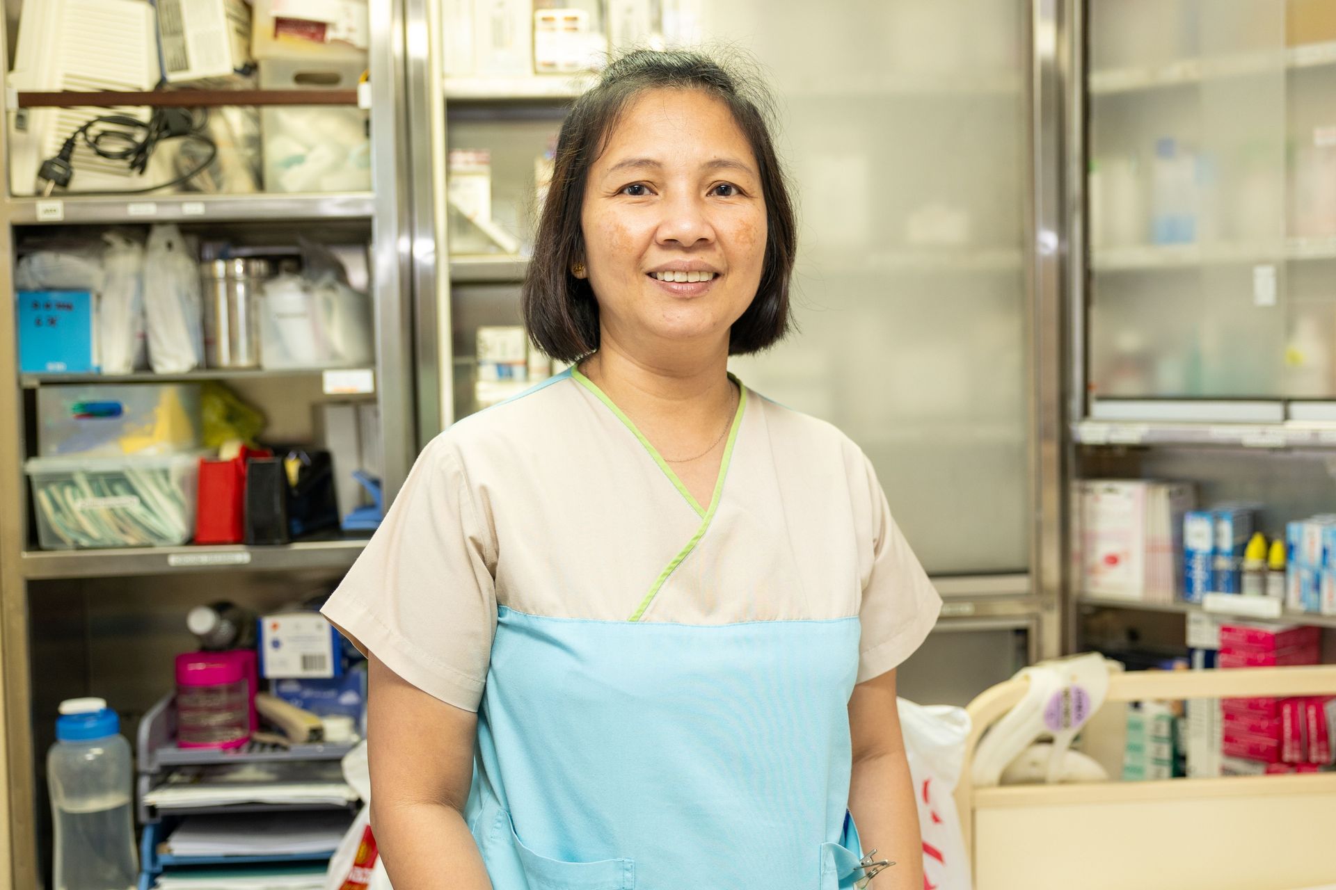 Singapore, Singapore :: The onboard nurse Einnor (Philippines) in the ship's clinic.
