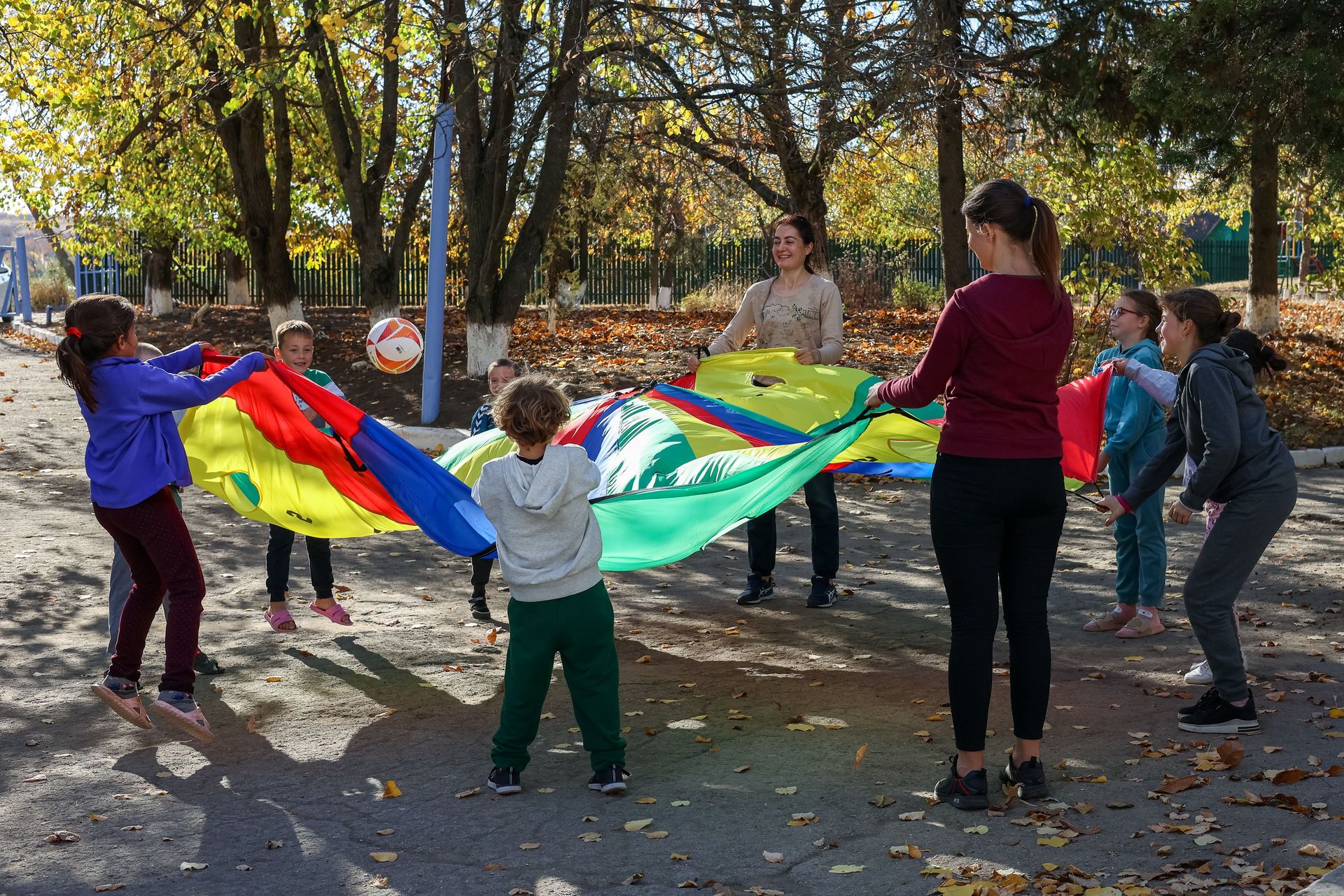 A short term team plays games with some children at a children's programme in Moldova. Photo by Jordan Wilkinson.