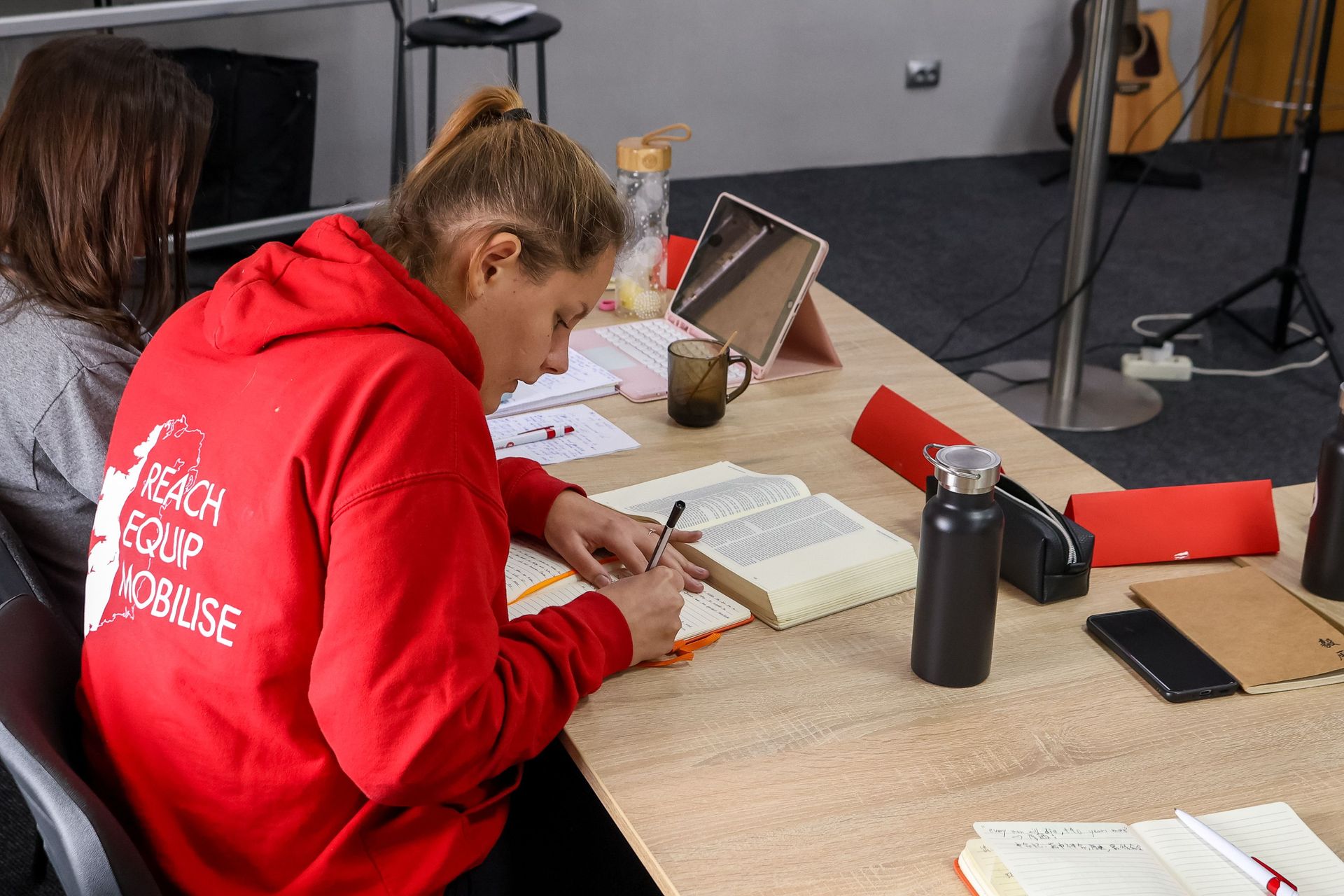 A REACH participant taking notes during a session. Photo by Jordan Wilkinson.