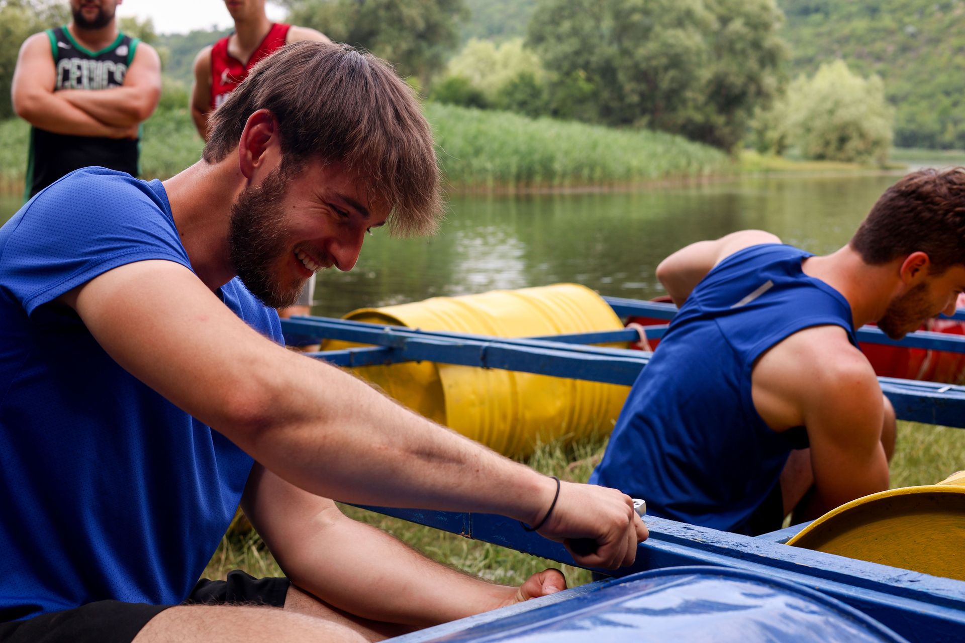 A young man helps construct a raft for a River Adventure outreach in Moldova. Photo by Jordan Wilkinson.