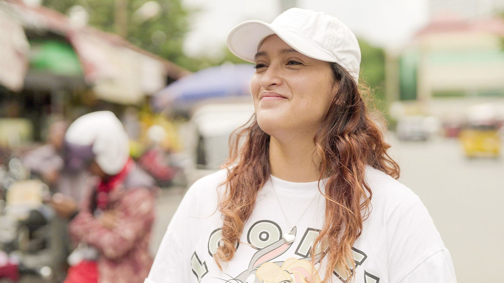 Phom Penh, Cambodia :: Urpi (Peru) smiles as she explores the local area during time off the ship