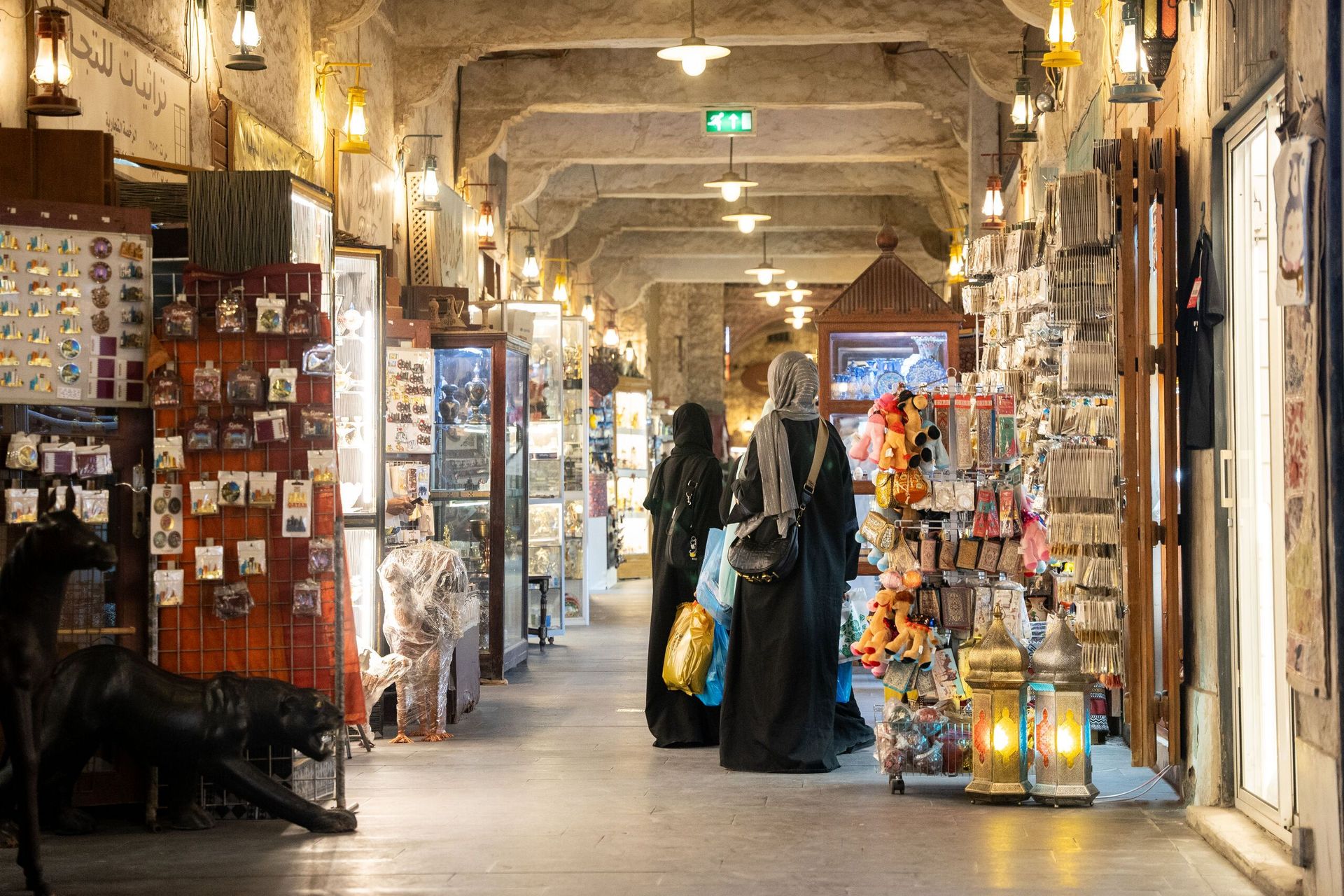 Women walk through the souq in Doha, Qatar. Photo by RJ Rempel.